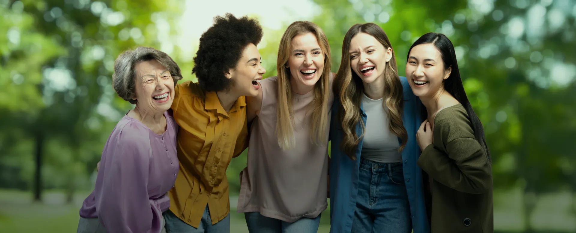 Five joyous women representing gynaecology care.